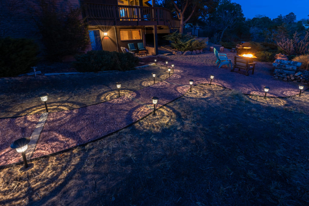 Illuminated pathway to entertaining area and covered patio - Casa Bear